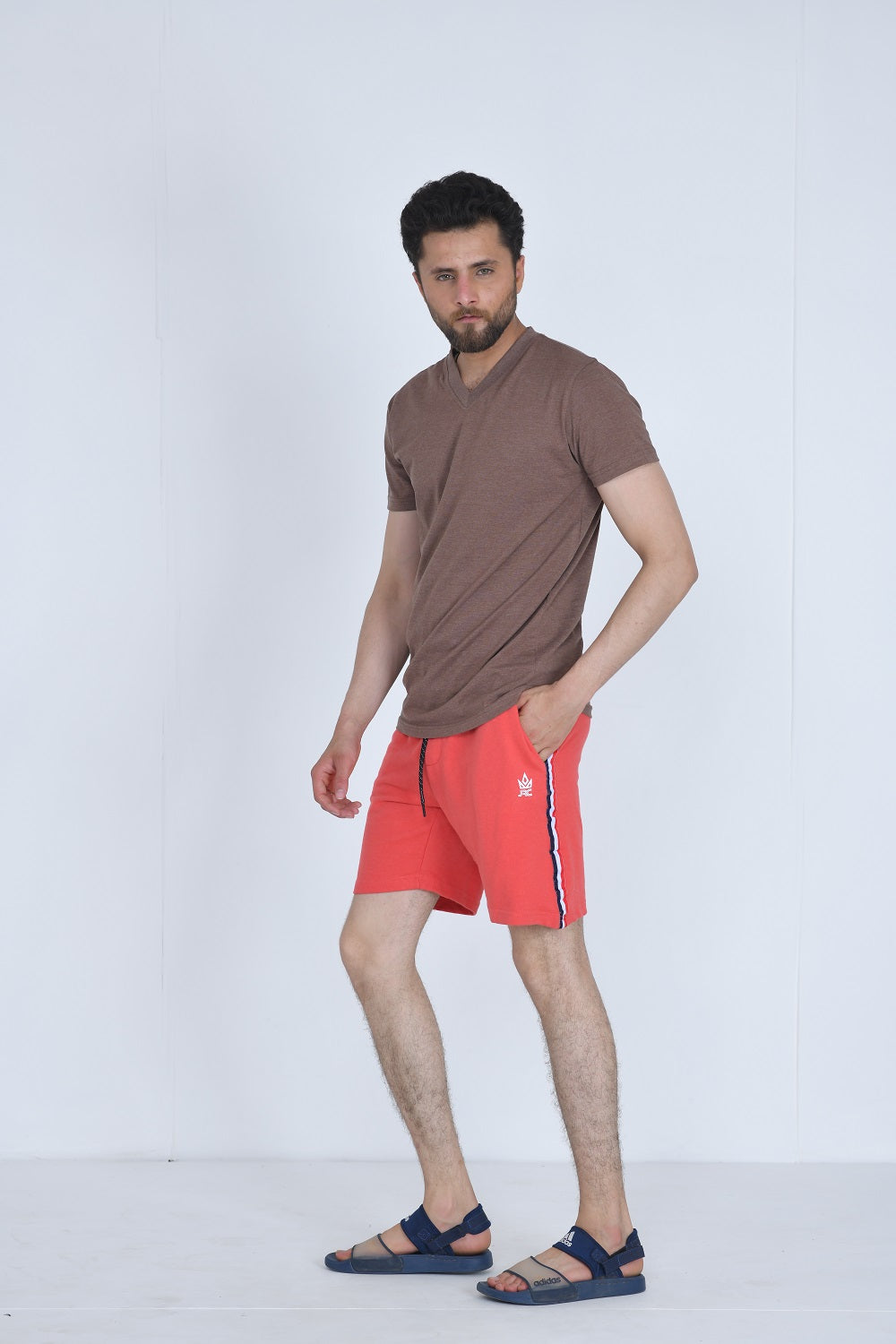 Men's strawberry pink gym shorts with strap detail
