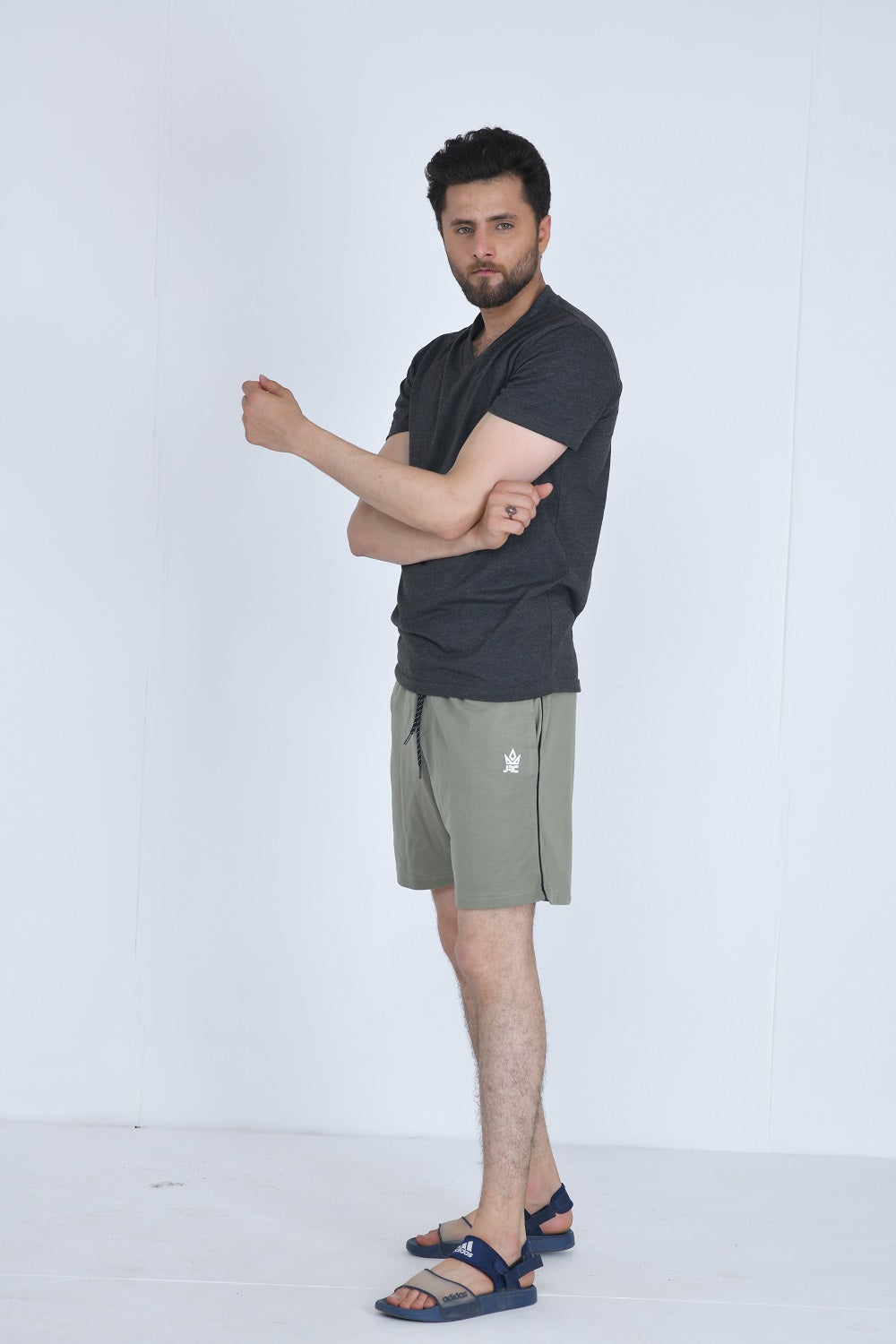 Men's olive gym piping shorts - side view